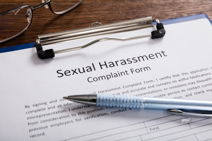 Sexual Harassment Complaint Form With Pen
