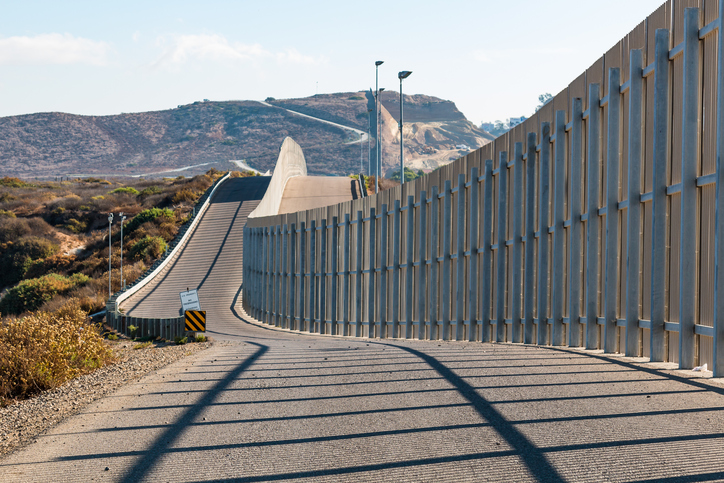 International Border Wall Between San Diego and Tijuana Extending into Distant Hills