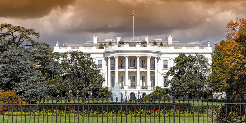 Stormy view of the White House in Washington DC, with stormy sky.