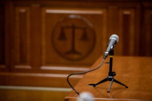 microphone on a table in a courtroom